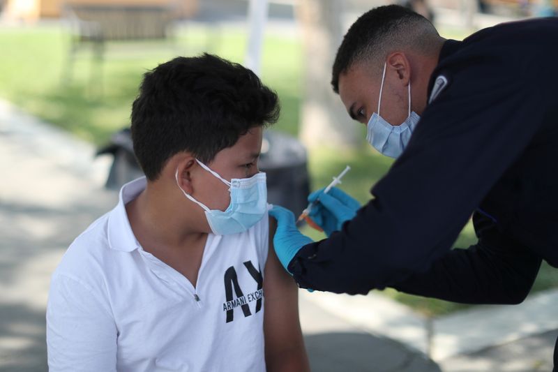 U.S. ramps up youth vaccinations as school year kicks off